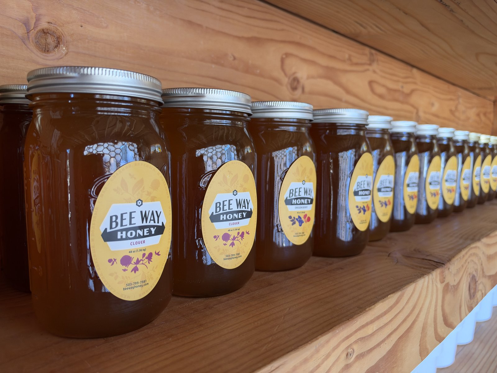 Bee Way Raw Honey Jars on Cedar Shelves
